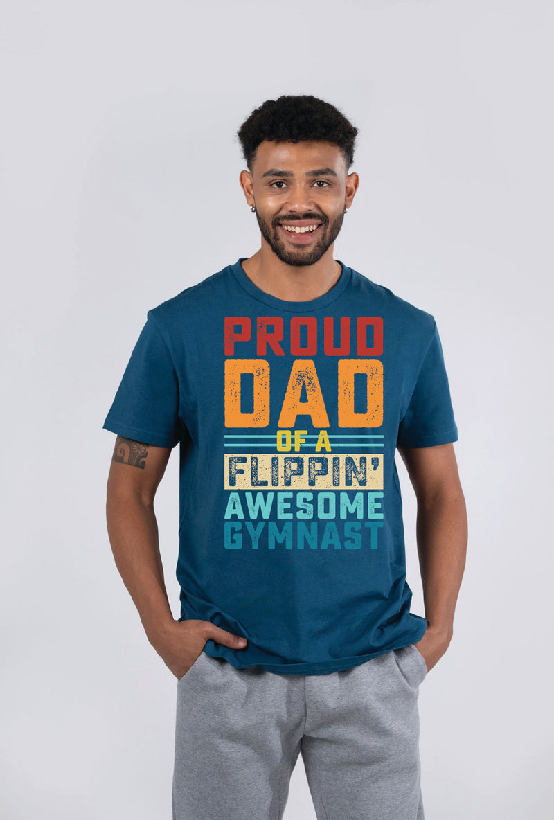 Man wearing a blue t-shirt with text 'Proud Dad of a Flippin' Awesome Gymnast' on a white background